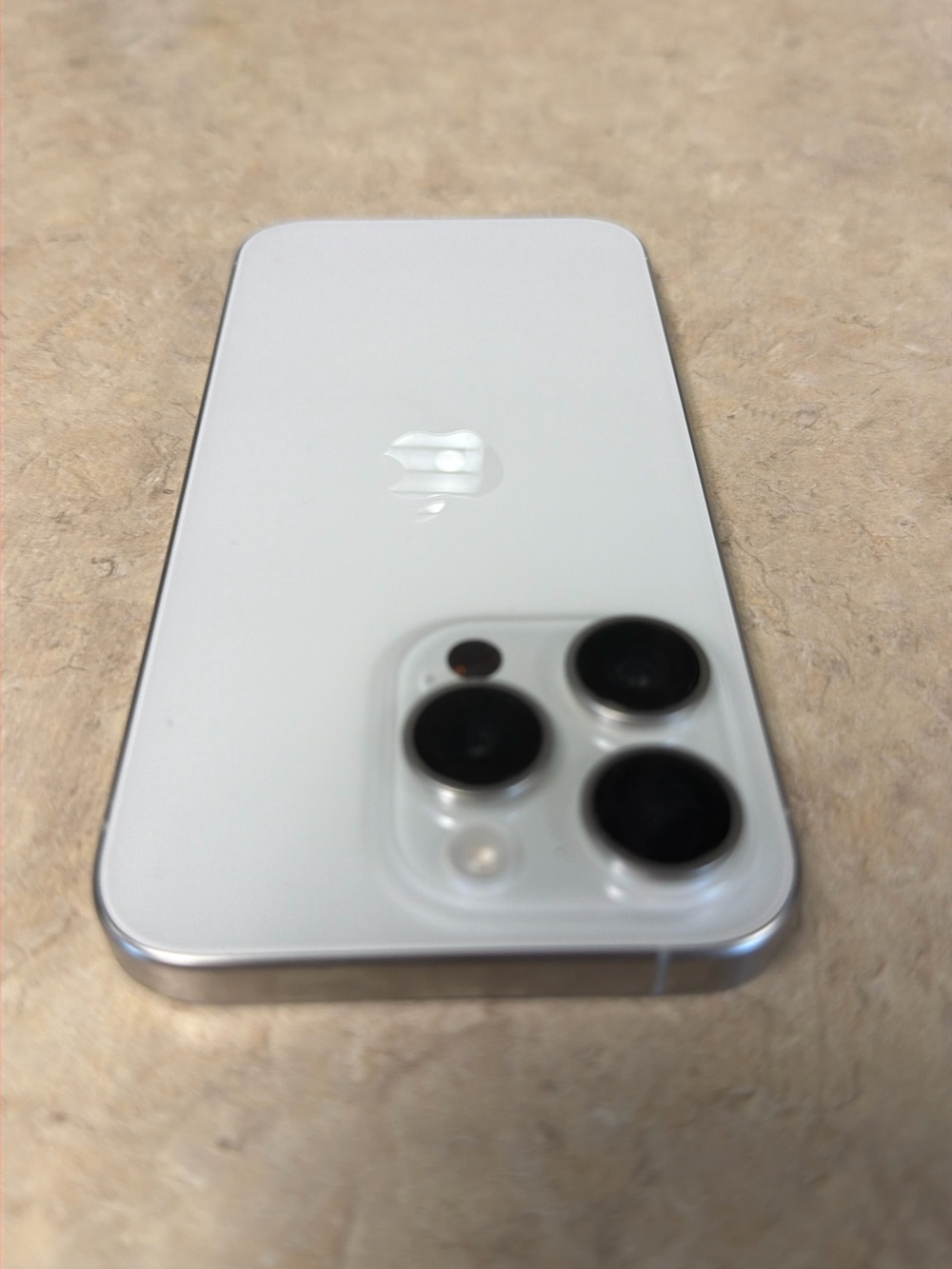 Apple iPhone in White with Silver Frame with triple  256 GB